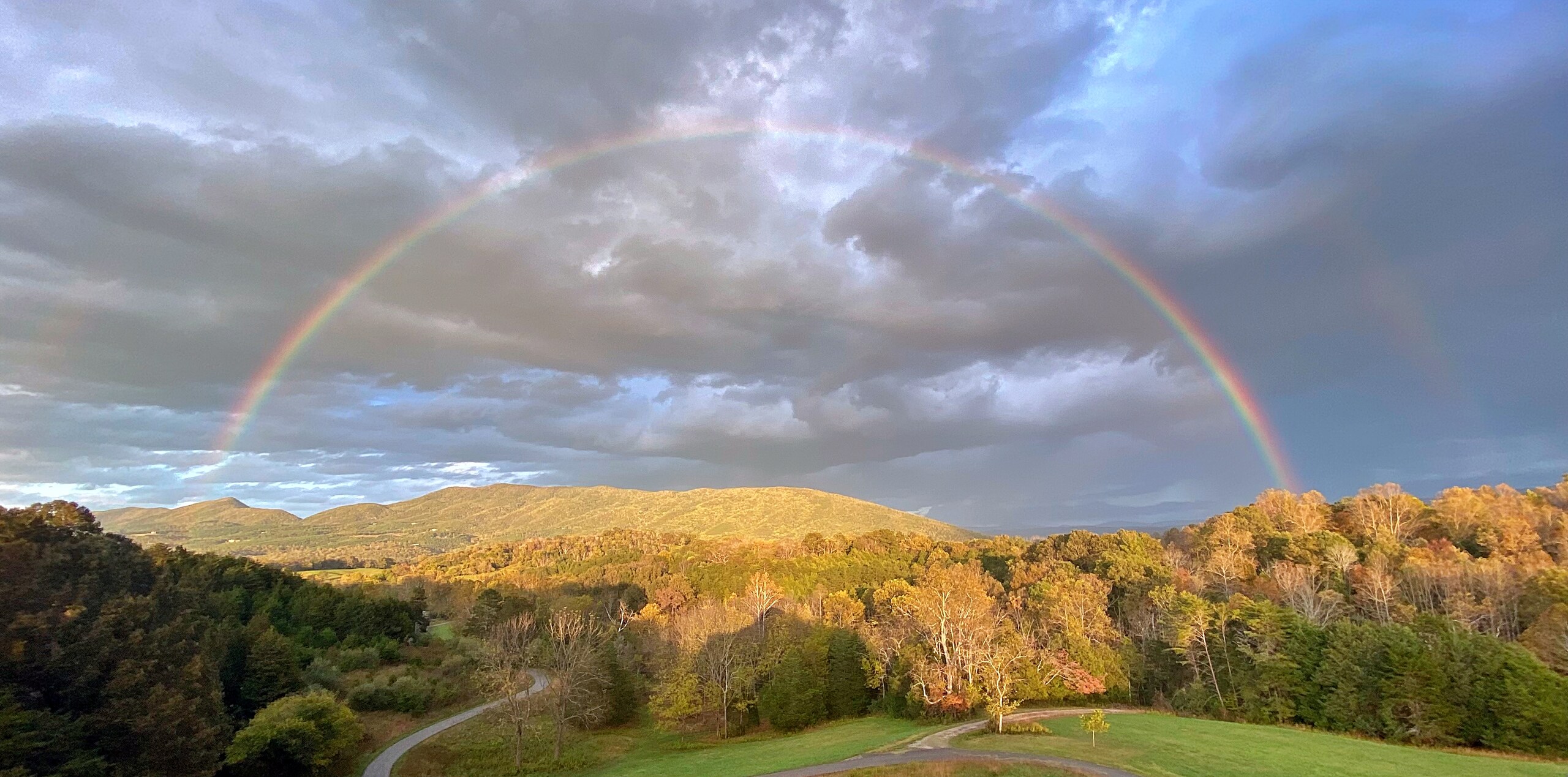 Rainbow over Arroway Manor and the surrounding mountains