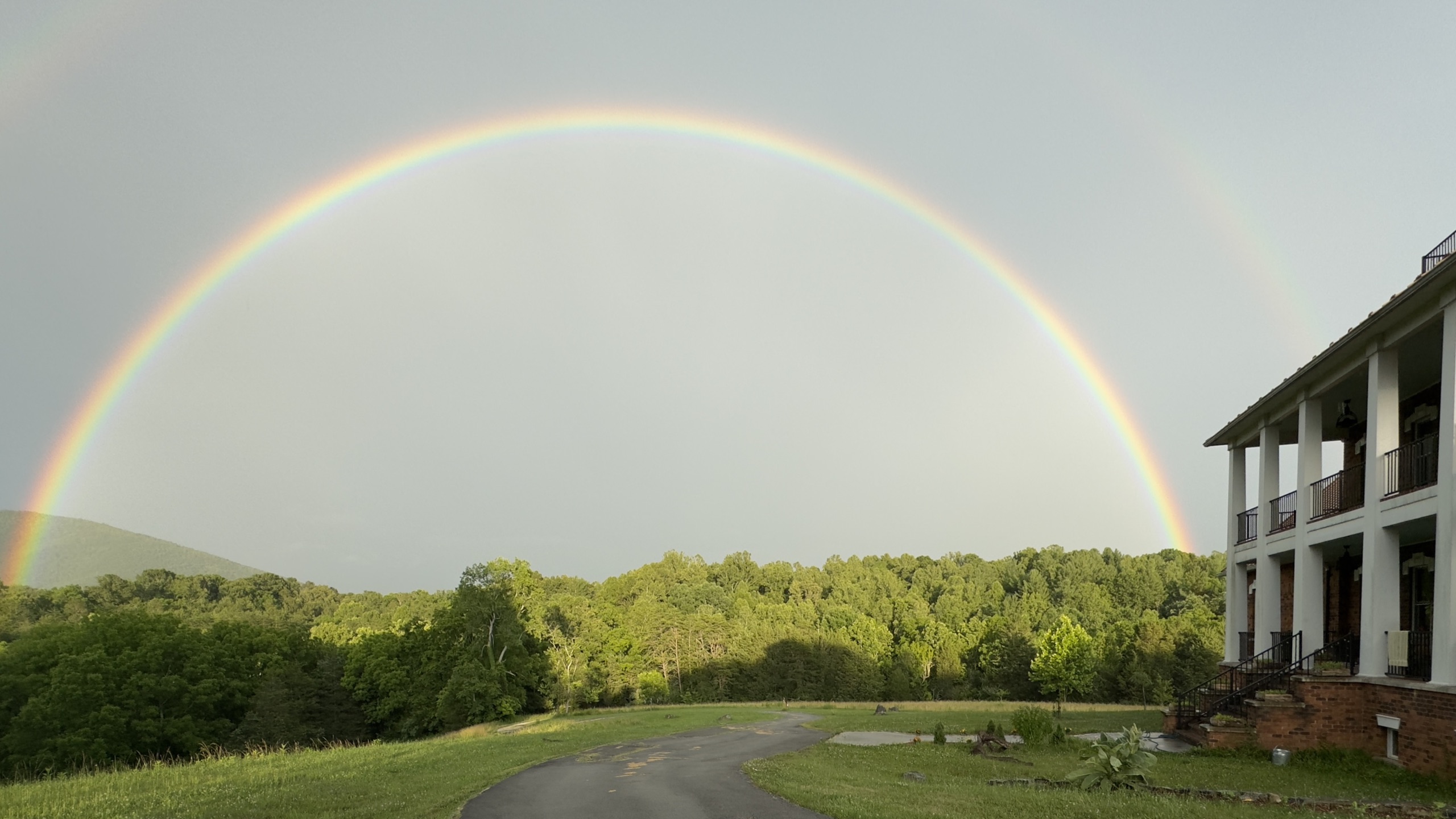 Rainbow over mountain landscape viewed from Arroway Manor