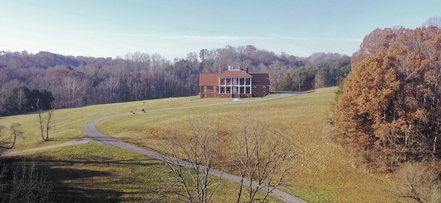 Front view of Arroway Manor in autumn